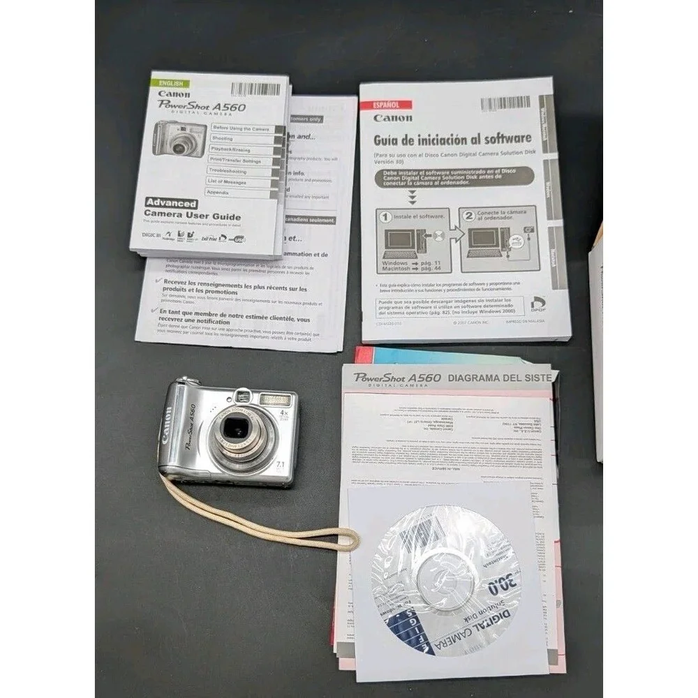 Canon PowerShot A560 7.1 MP Digital Camera With 4x Optical Zoom Silver No Card